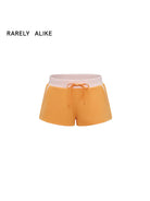 RARELY ALIKE Color Block Cotton Blend Sweatshorts in Orange