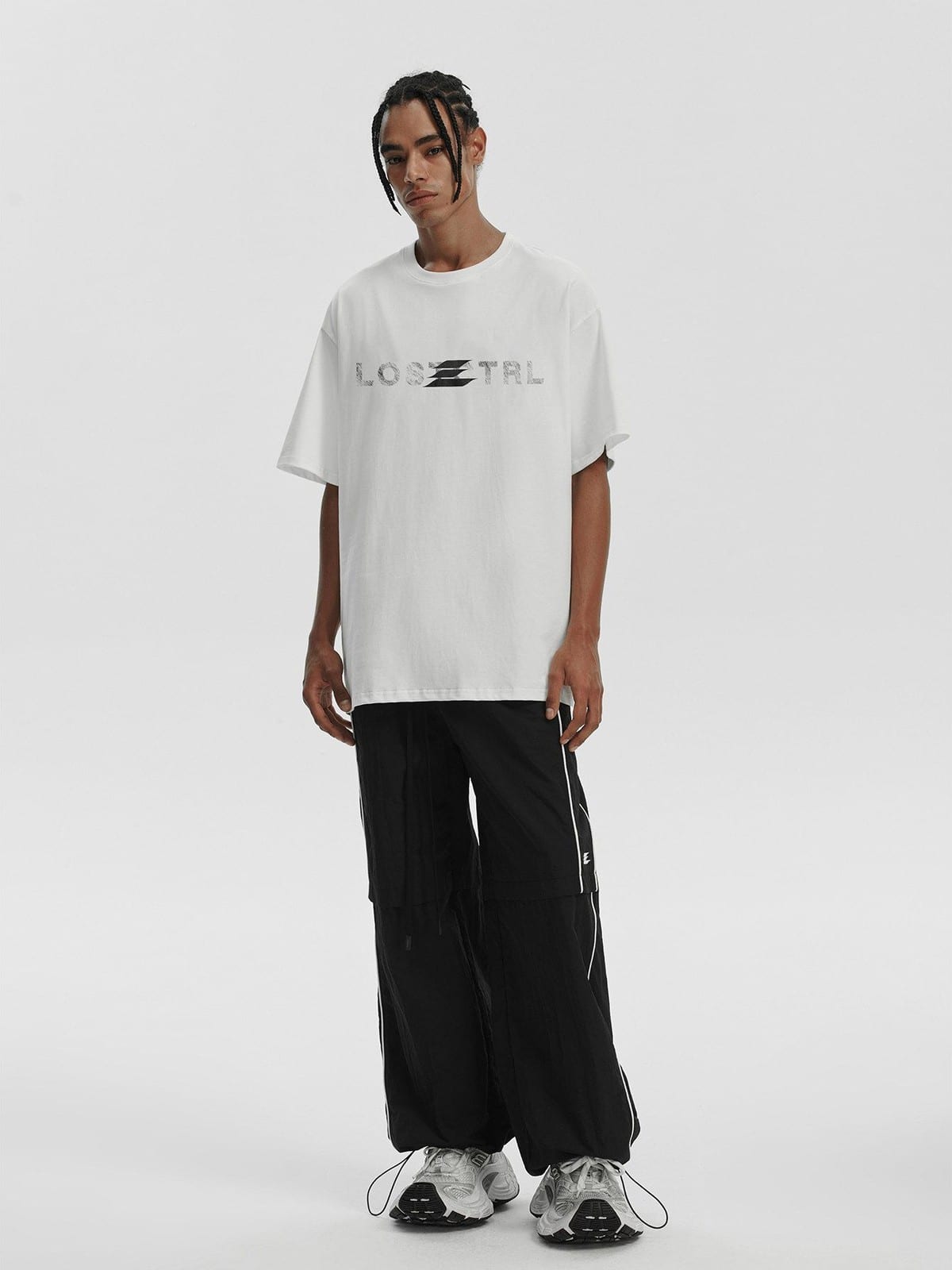 LOSTCTRL Distressed Logo Print Cotton T Shirt in White - On Male Model