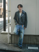 Retro 21 Distressed Faux Leather Biker Jacket in Black - On Male Model