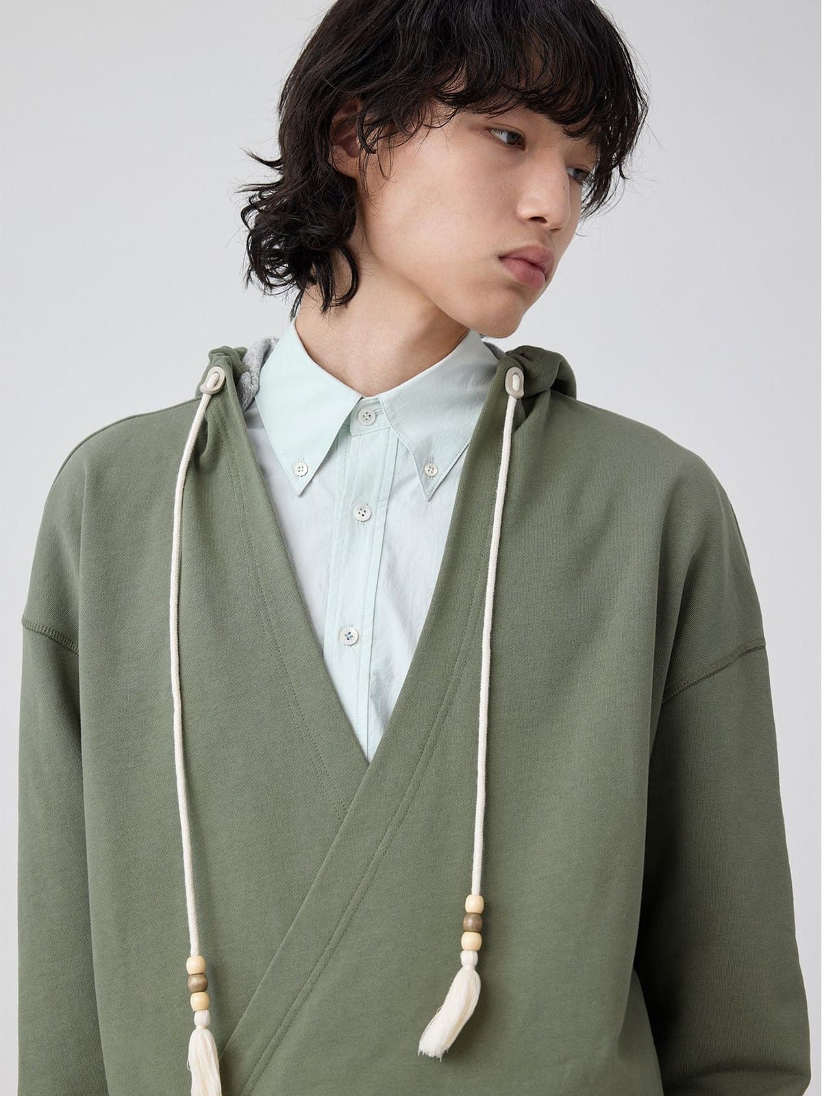 SIMPLE PROJECT Overlapping Slant Placket Hoodie in Olive - On Male Model