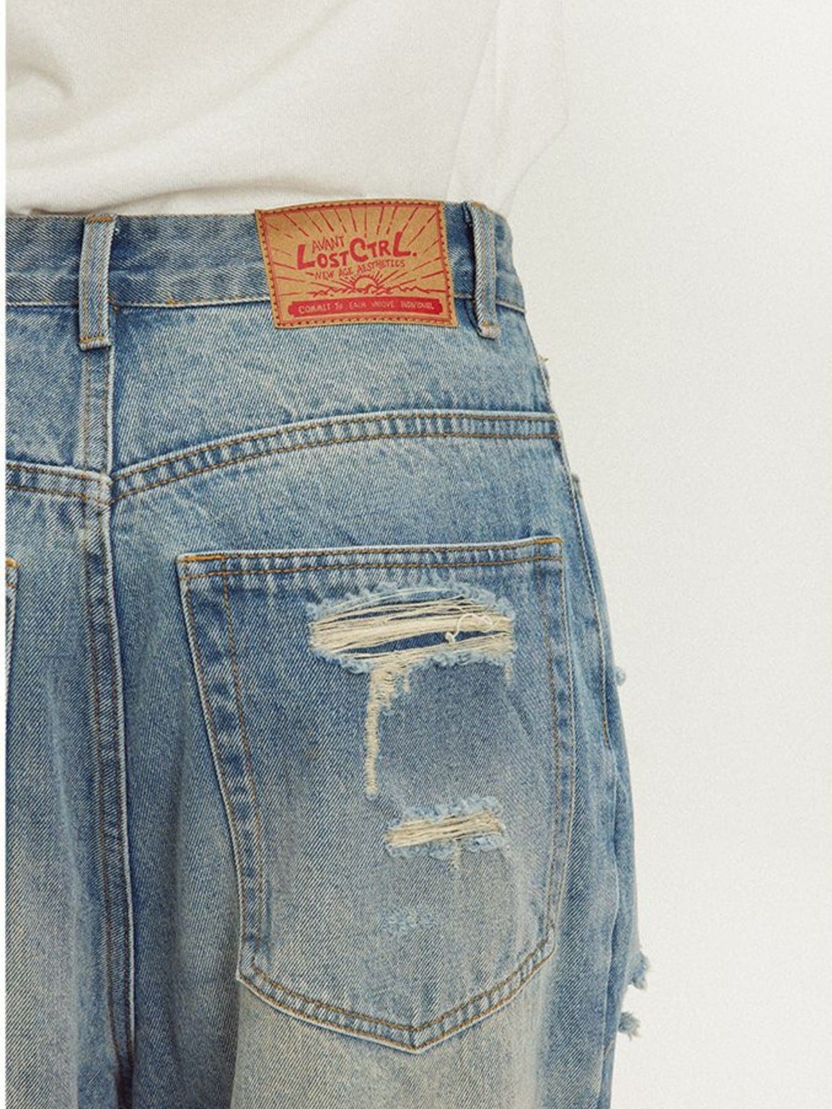 LOSTCTRL Heavy Distressed Double Layer Jeans in Blue - On Model