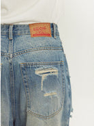 LOSTCTRL Heavy Distressed Double Layer Jeans in Blue - On Model