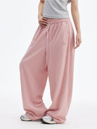 MEDM Lightweight Wide Leg Track Pants in Pink - On Female Model
