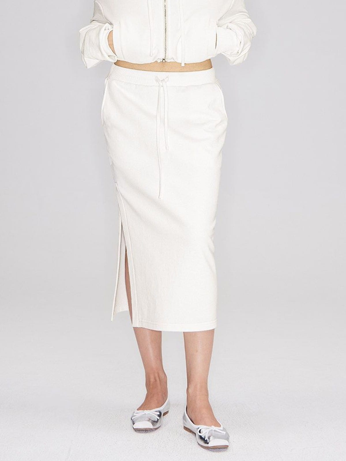 RARELY ALIKE Cotton Side Slit Midi Skirt in White - On Female Model
