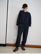 MSBEAST Fleece Lined Cotton Sweatshirt Pants Set in Navy Blue - On Female Model