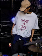 USAGE JZ Festival Graphic Cotton T Shirt in Heather Gray - On Male Model
