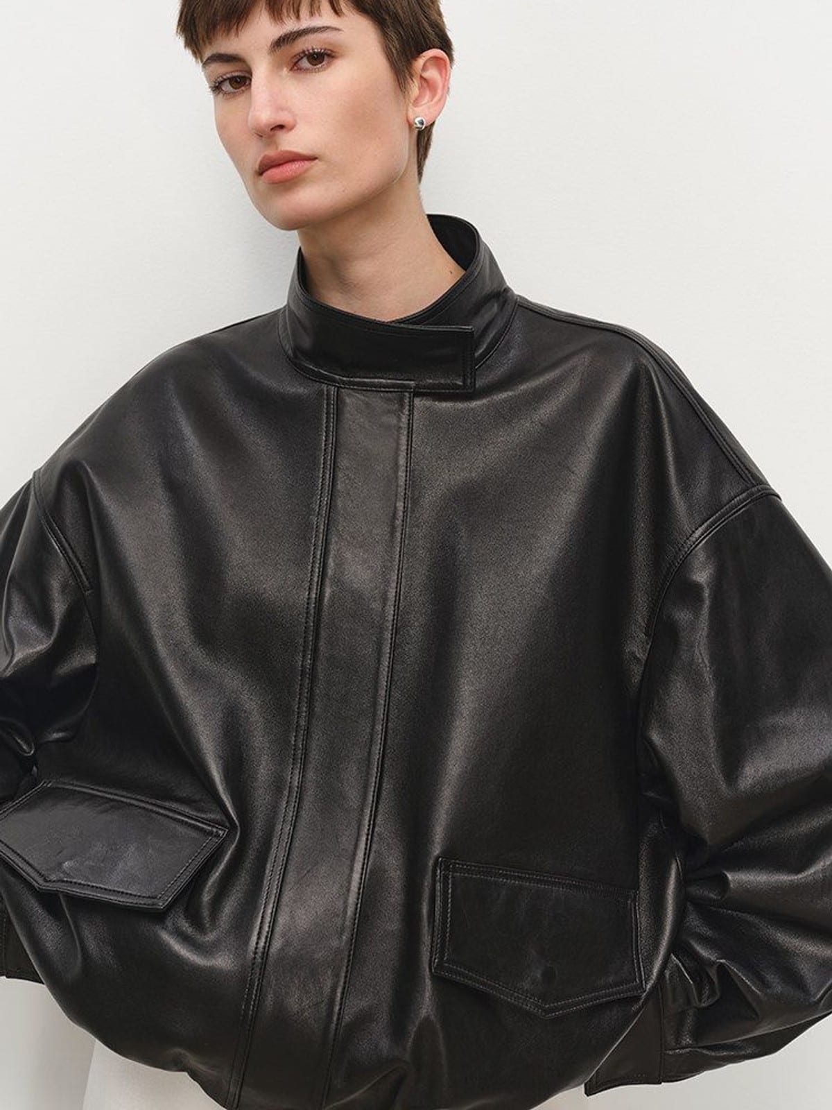 MSBEAST Oil Waxed Sheepskin Stand Collar Jacket in Black - On Female Model