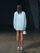 SMFK Cross Badge Cotton Cargo Shirt in White - On Female Model