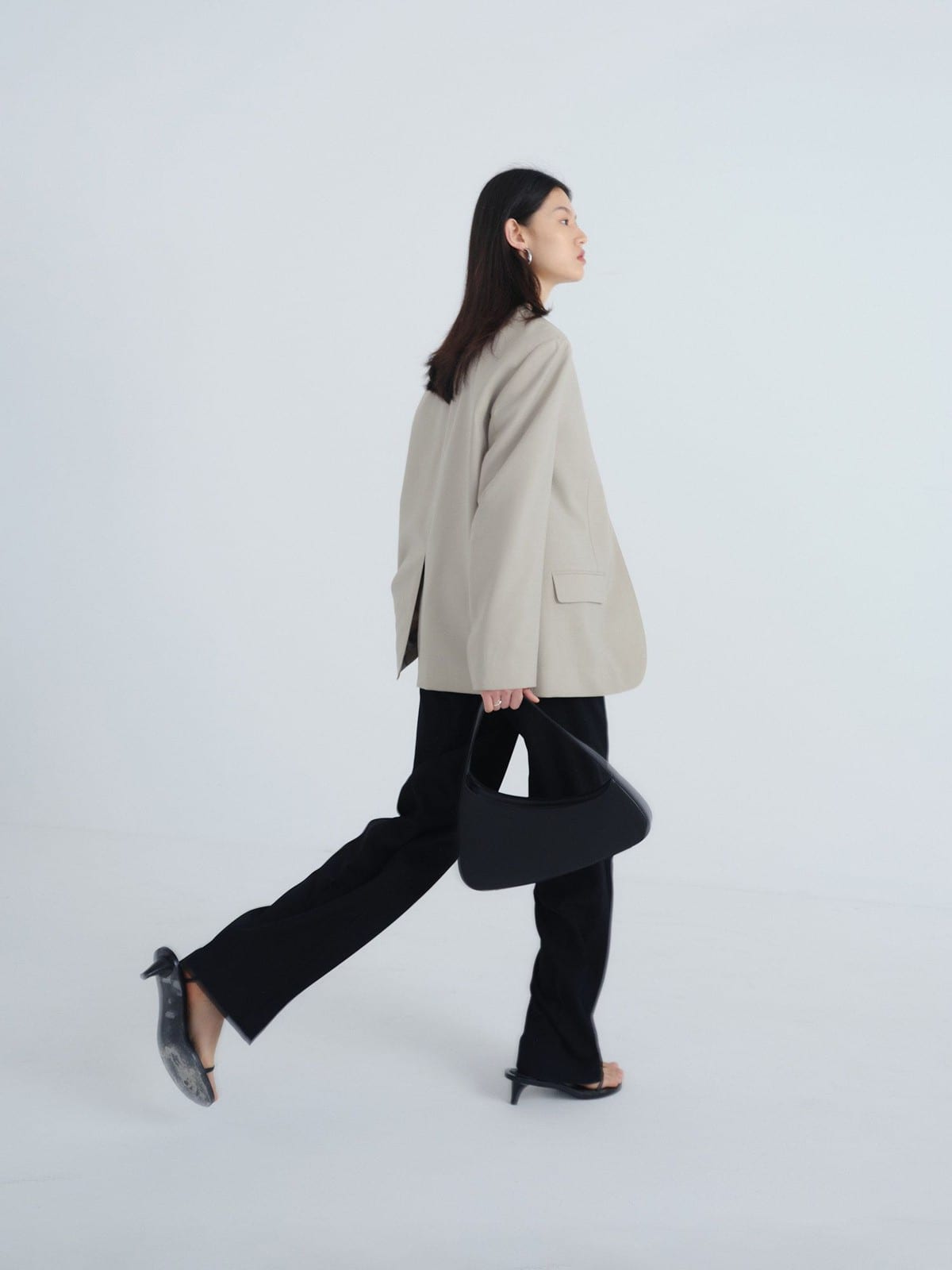 Random Piece Merino Wool Straight Leg Trousers in Black - On Female Model