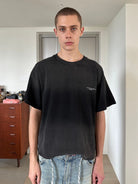 UNKNOWNWORLD Small Logo Cotton T Shirt in Black - On Male Model