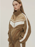 LOSTCTRL Vintage Monogram Track Jacket in Beige - On Female Model