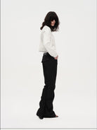 RARELY ALIKE Curved Leg Flared Dress Pants in Black - On Female Model