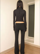 RARELY ALIKE Low Rise Layered Flared Yoga Pants in Black - On Model