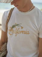 Retro 21 California Graphic Cotton T Shirt in White - On Male Model