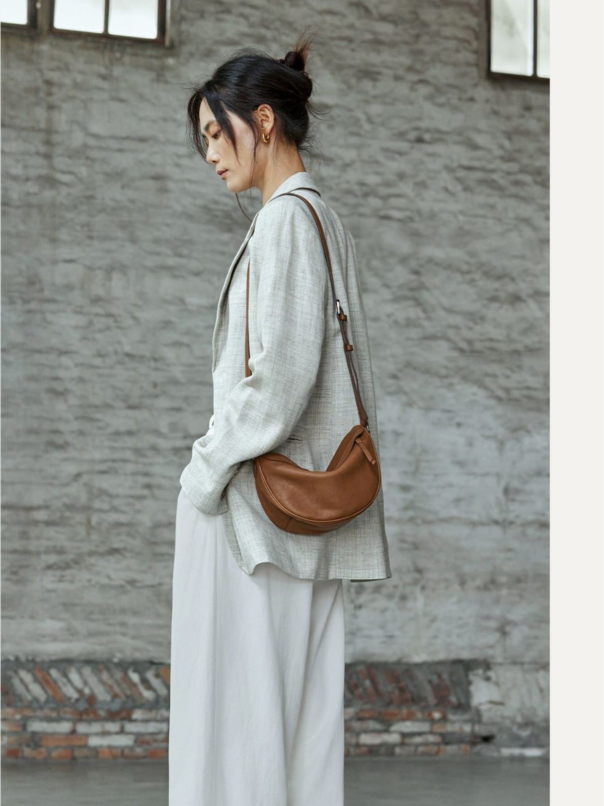 QIUZHEN Vegetable Tanned Leather Crescent Bag in Gray - On Female Model