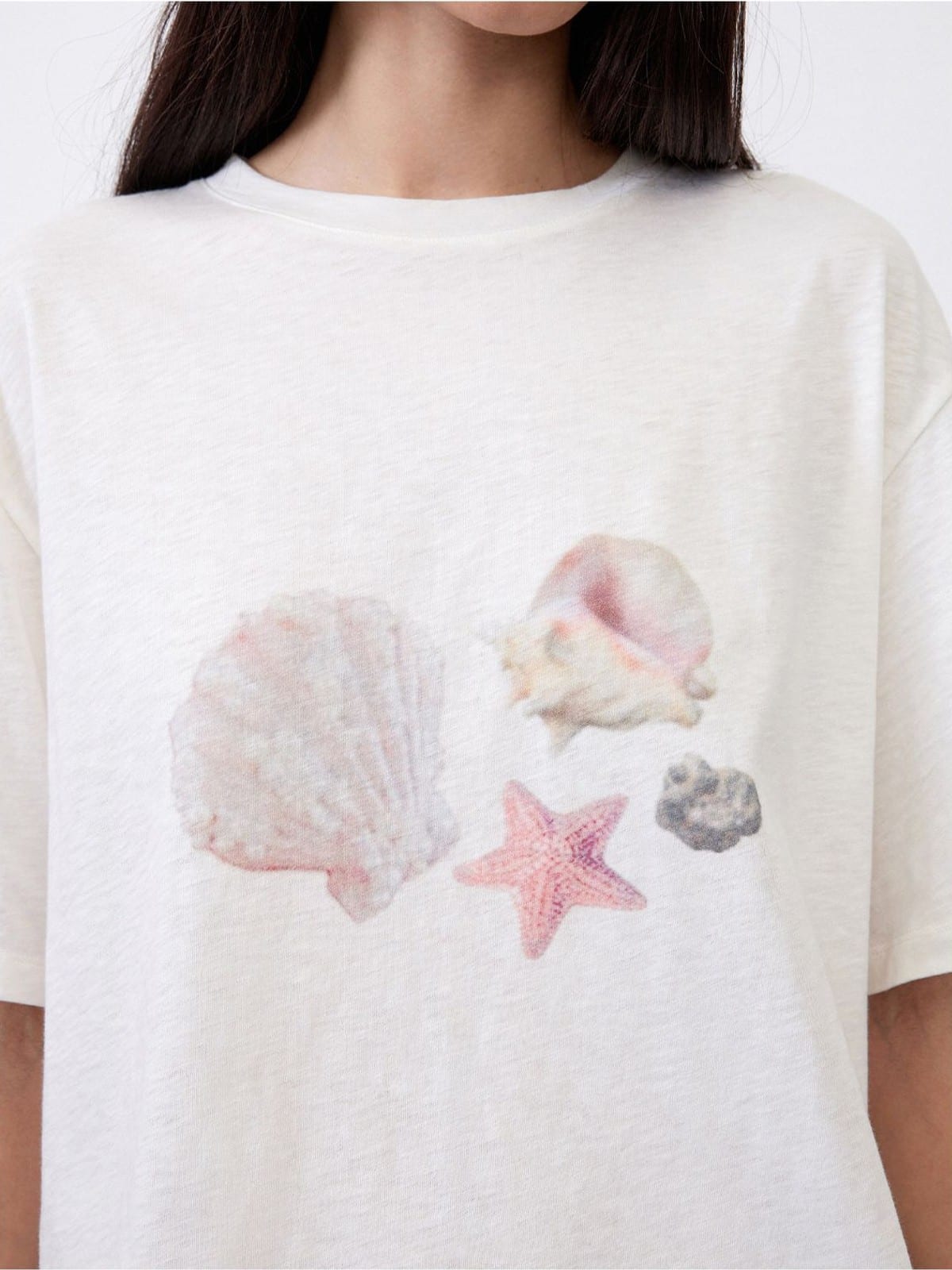Random Piece Shell Print Cotton Lyocell T Shirt in Cream - On Female Model