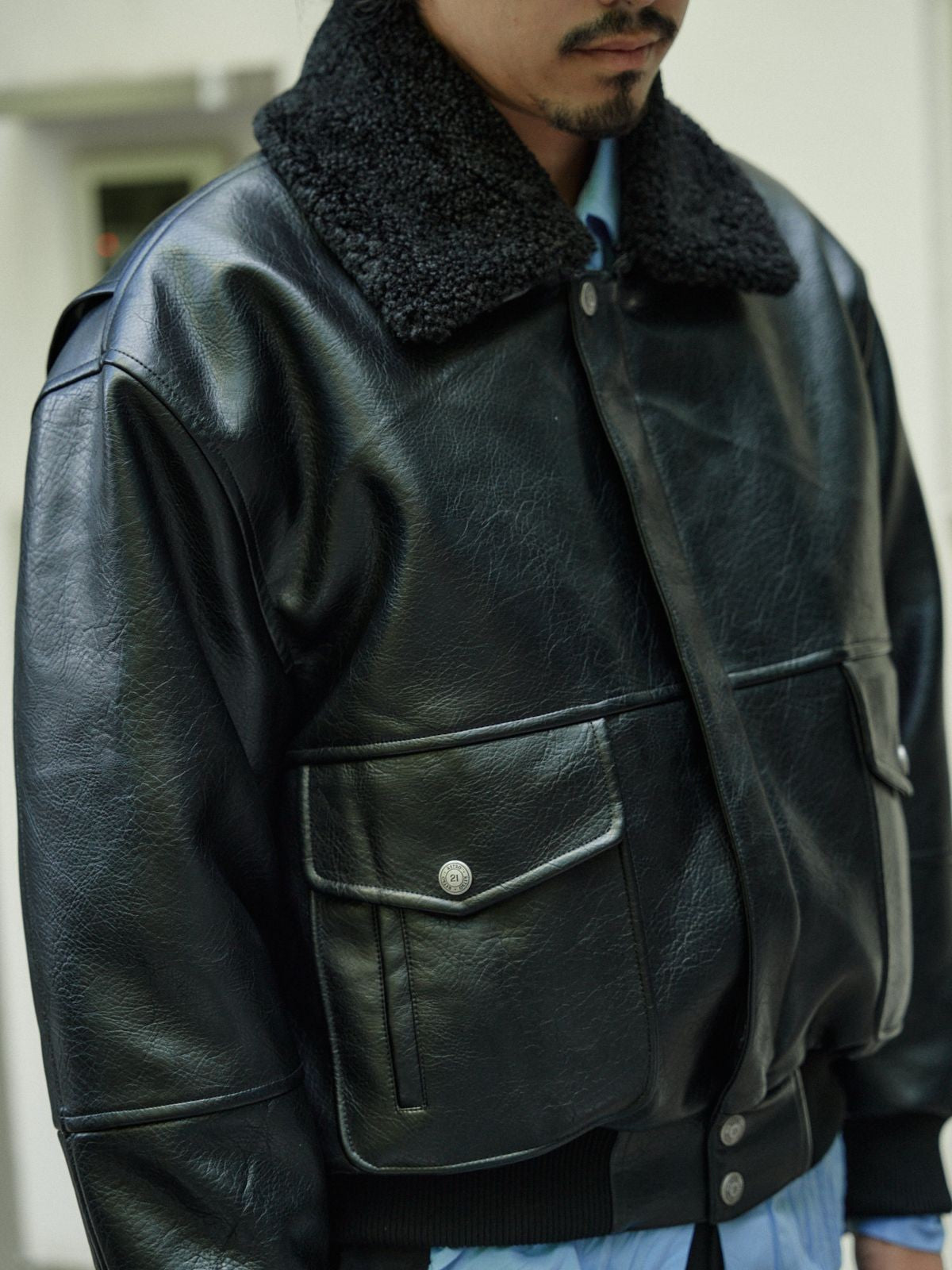 Retro 21 Faux Leather Biker Jacket with Fur Collar in Black - On Male Model