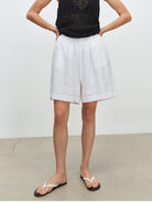 MSBEAST 100 Linen Knee Length Shorts in White - On Female Model