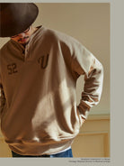 USAGE Terry Cotton Henley Sweatshirt in Beige - On Male Model