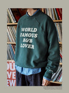USAGE Heavyweight Raglan Graphic Sweatshirt in Green - On Male Model