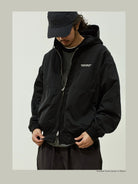 USAGE Crinkle Nylon Hooded Track Jacket in Black - On Male Model
