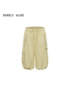RARELY ALIKE Cropped Cotton Lantern Cargo Shorts in Beige