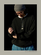 USAGE Heavyweight Waffle Knit Henley Sweatshirt in Black - On Male Model