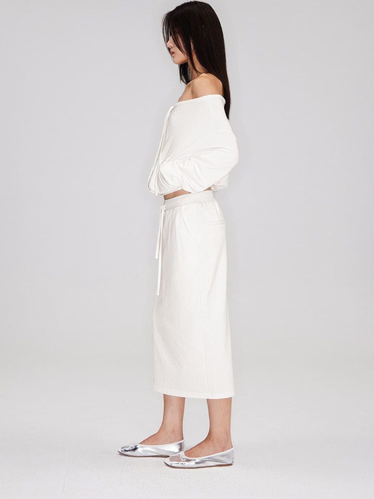 RARELY ALIKE Cotton Side Slit Midi Skirt in White - On Female Model