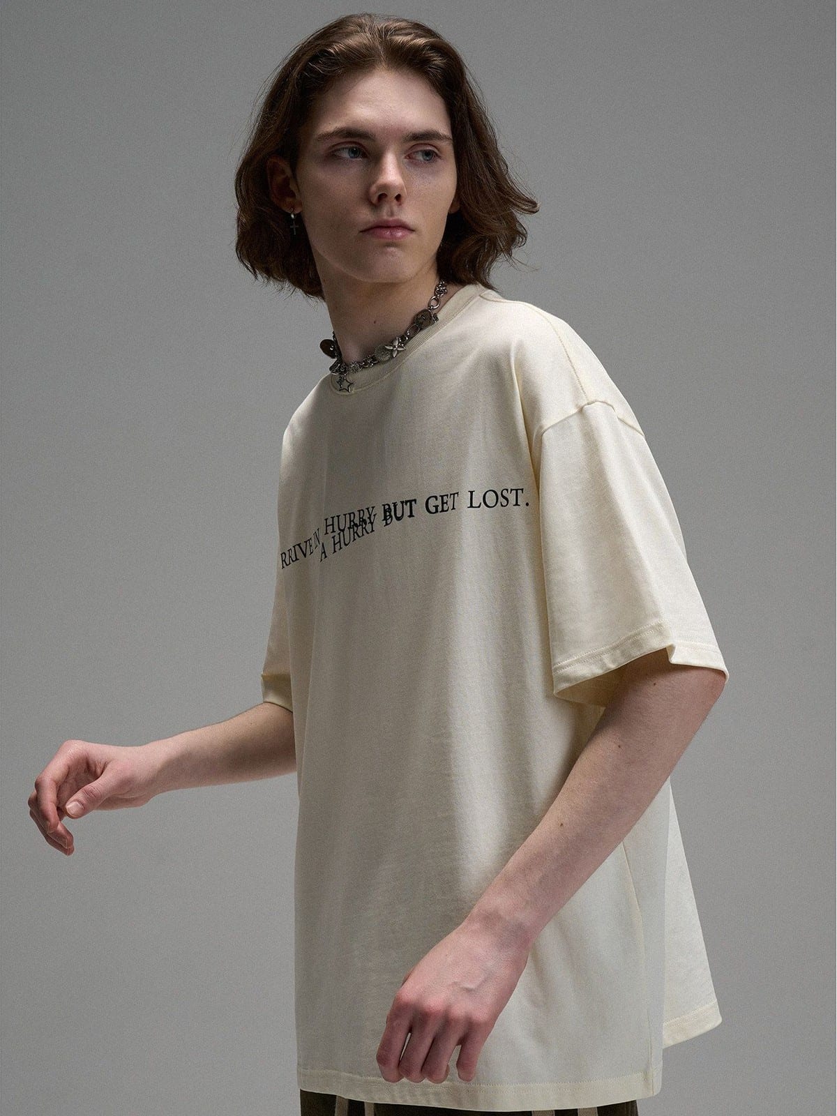 LOSTCTRL Heavyweight Letter Print T Shirt in Cream - On Male Model