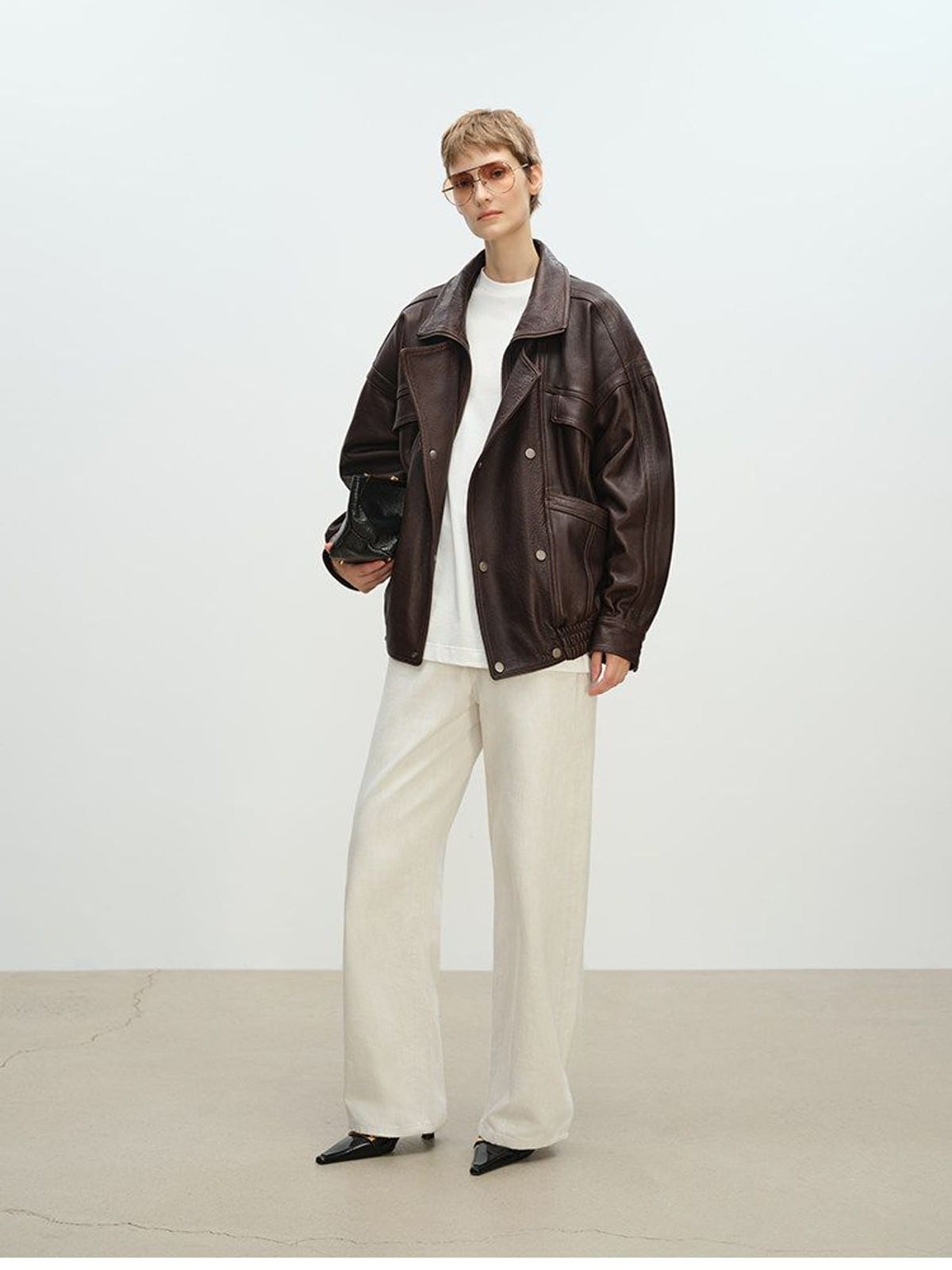 MSBEAST Stand Collar Textured Leather Jacket in Brown - On Female Model