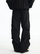 MEDM Glossy Piped Techwear Track Pants in Black - On Model