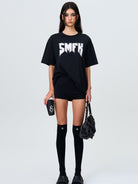 SMFK Metallic Logo Cotton T Shirt in Black - On Female Model