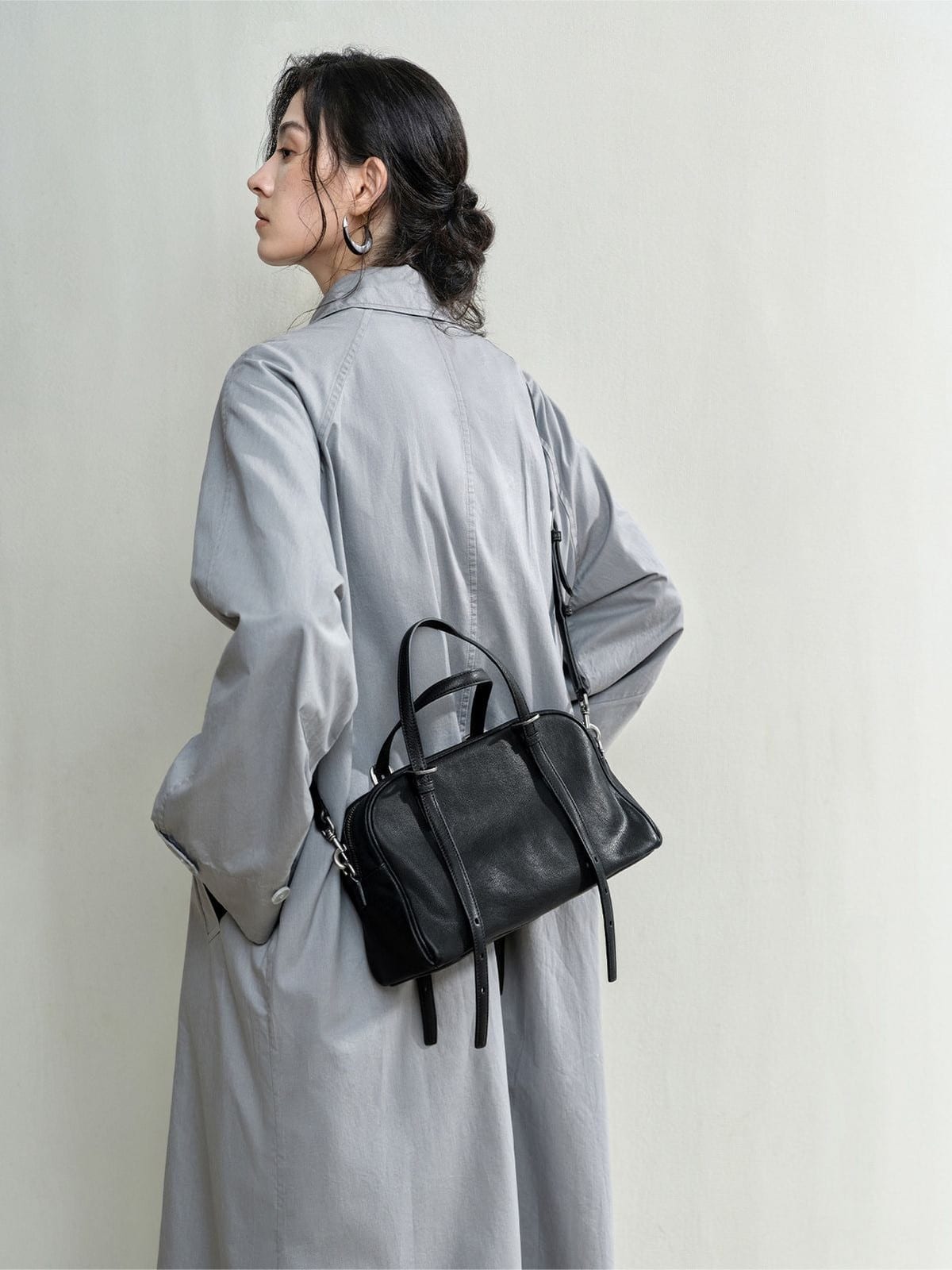 QIUZHEN Vegetable Tanned Kidskin Bowling Bag in Black - On Female Model
