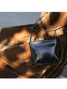PANLULUPAN Waxed Cowhide Square Shoulder Bag in Black - On Female Model