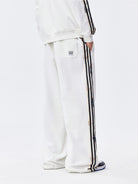 MEDM Lace Paneled Striped Track Pants in White - On Model