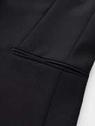TEASEL Merino Wool Pleated Trousers in Black - Detail