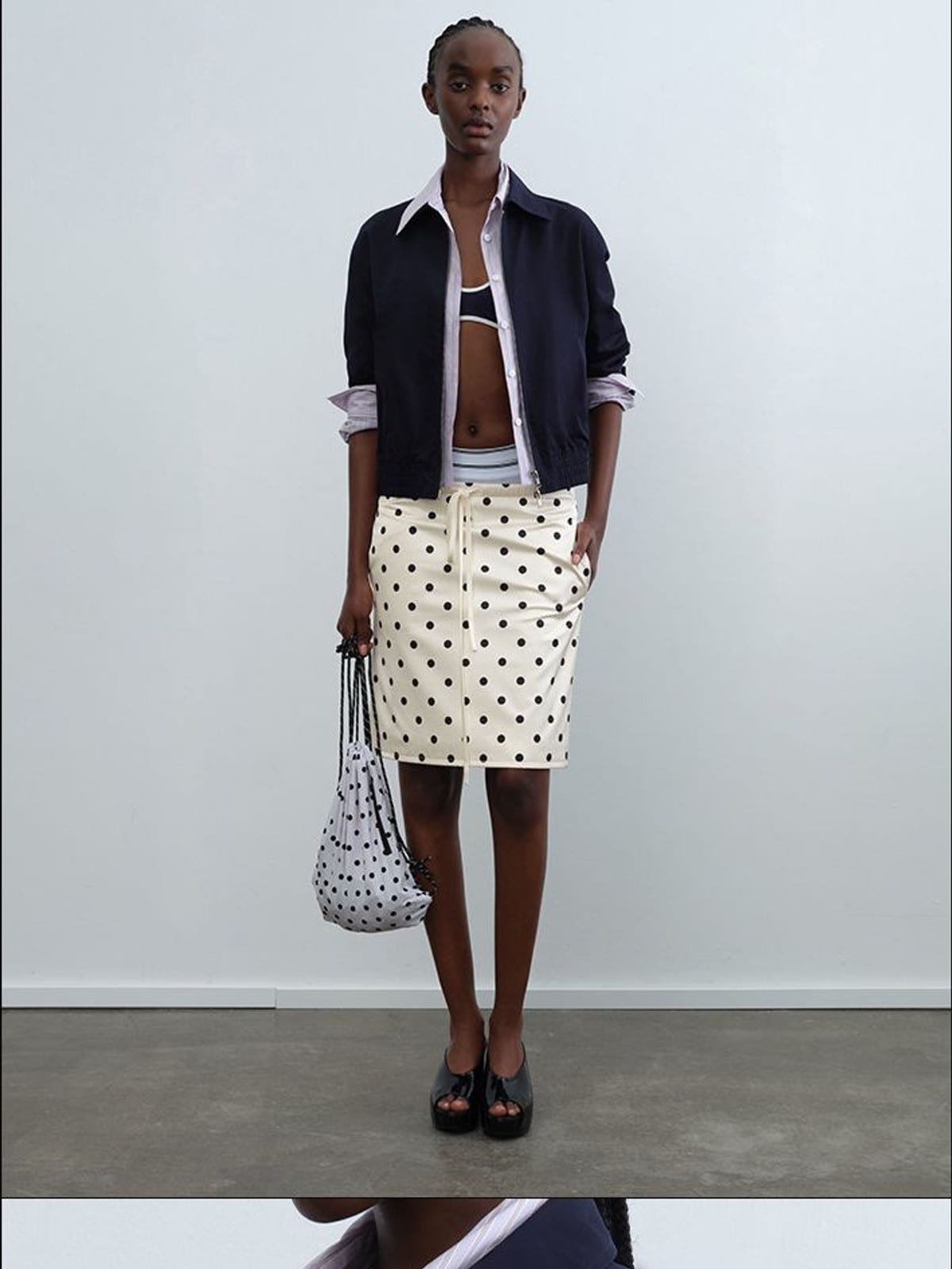RARELY ALIKE Mock Layer Striped Cropped Jacket in Navy Blue - On Female Model