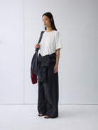 Random Piece Distressed Cotton Blend T Shirt in Charcoal - On Female Model