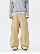 MEDM Embroidered Cotton Cargo Pants in Beige - On Model