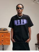 MEDM Glitch Logo Graphic Cotton T Shirt in Purple - On Male Model