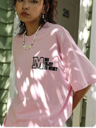 MEDM Half Sleeve Cotton Logo T Shirt in Pink - On Female Model
