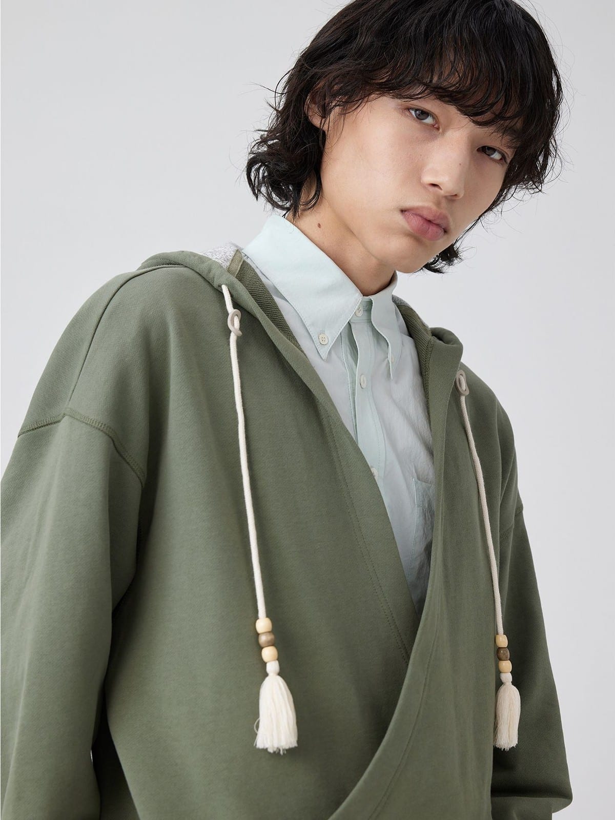SIMPLE PROJECT Overlapping Slant Placket Hoodie in Olive - On Male Model