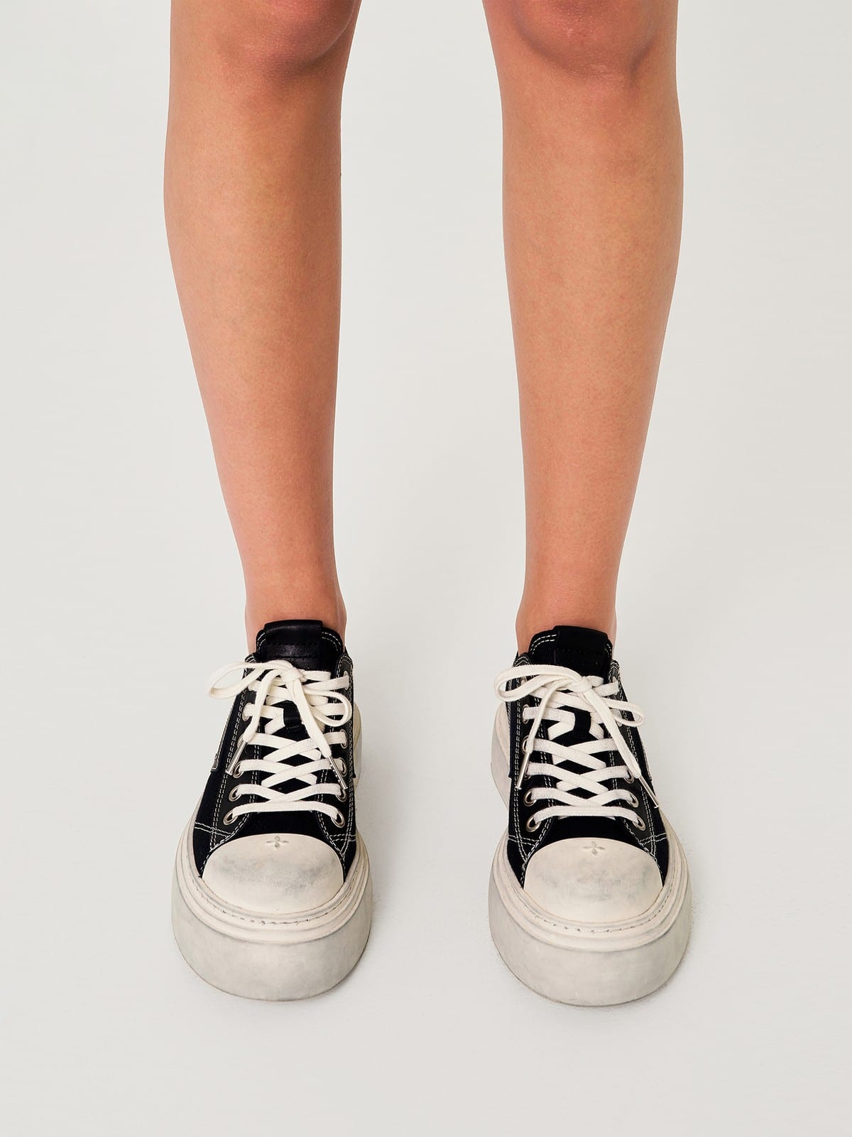 SMFK Distressed Canvas Skate Sneakers in Black - On Model