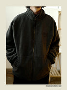 USAGE Reversible Nylon Fleece Track Jacket in Black - On Male Model