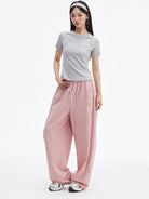 MEDM Lightweight Wide Leg Track Pants in Pink - On Female Model