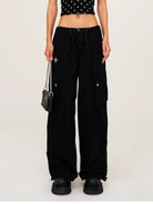 SMFK Wide Leg Parachute Cargo Pants in Black - On Female Model