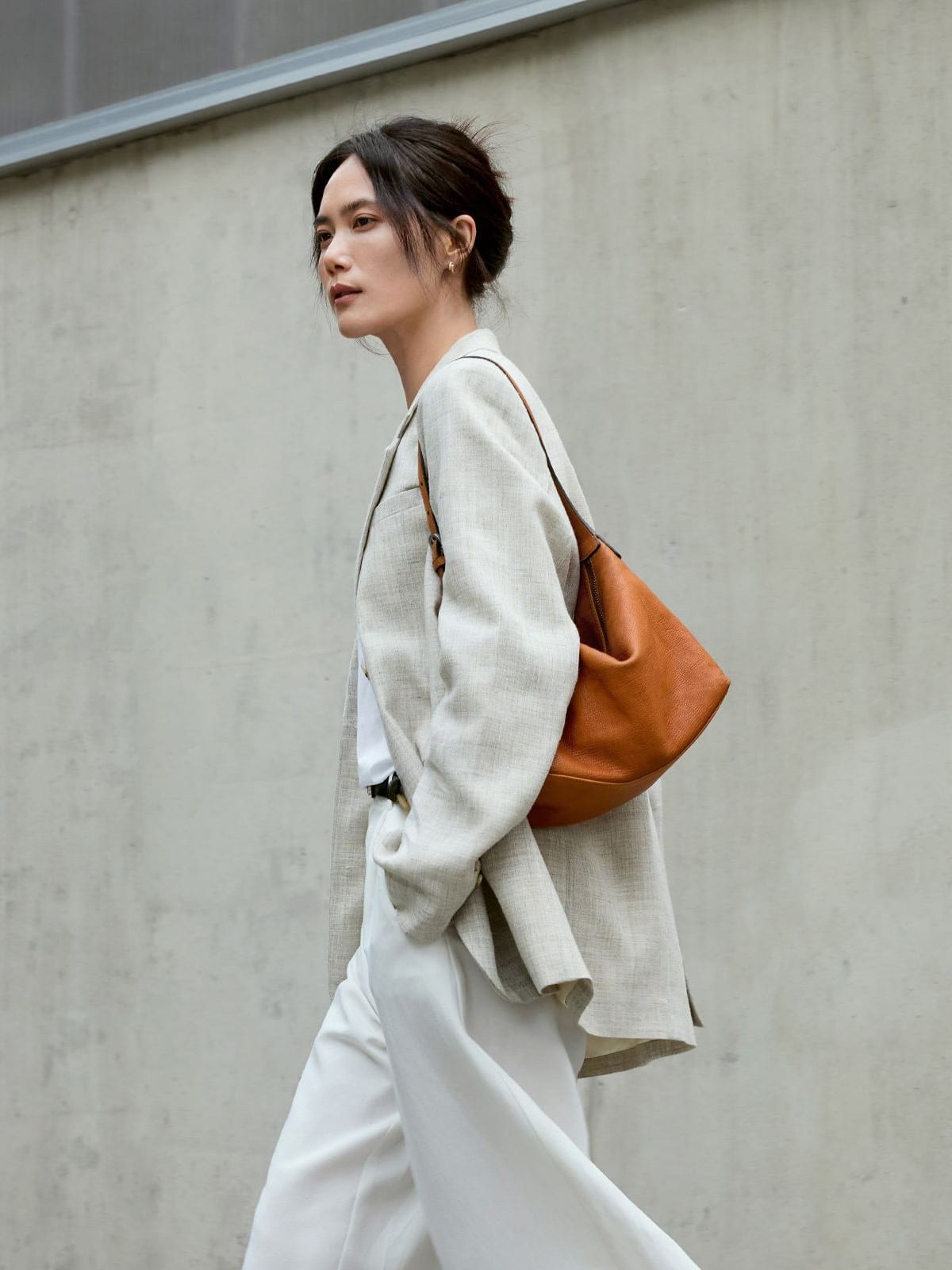 QIUZHEN Vegetable Tanned Calfskin Hobo Bag in Gray - On Female Model