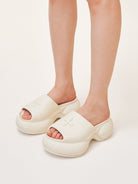 SMFK 7cm Platform Embossed EVA Slides in White - On Female Model