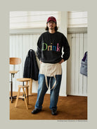 USAGE Washed Cotton Graphic Sweatshirt in Black - On Male Model