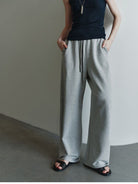 MSBEAST Cotton Terry Sweatshirt Tapered Joggers in Gray - On Female Model